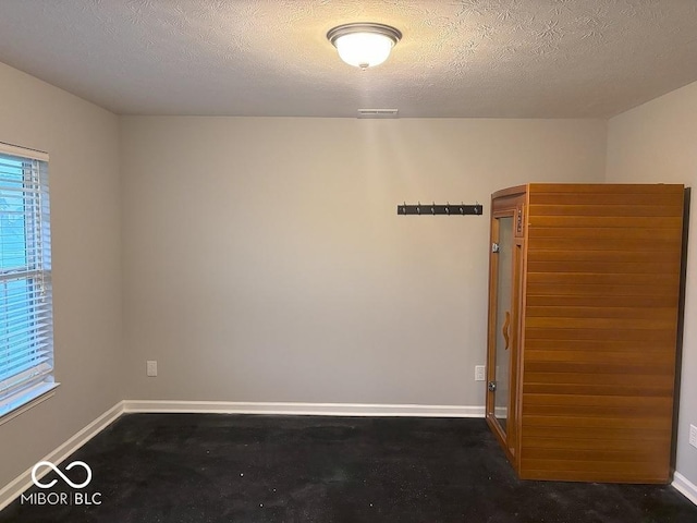 1287 Highland Lake Way, Brownsburg, IN 46112 - unfurnished room featuring baseboards and a textured ceiling