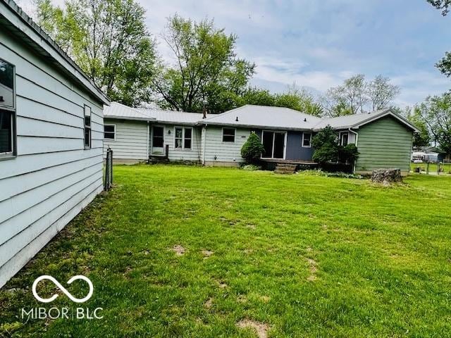 3824 Forest Ridge Dr, Fort Wayne, IN 46804 - back of house featuring a lawn