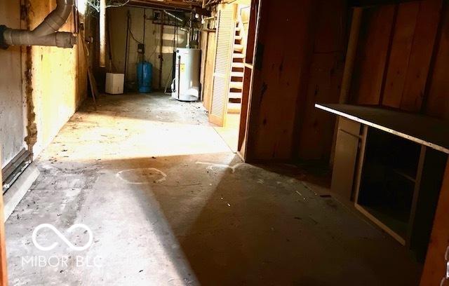 3824 Forest Ridge Dr, Fort Wayne, IN 46804 - unfinished basement with gas water heater and a water pressure tank