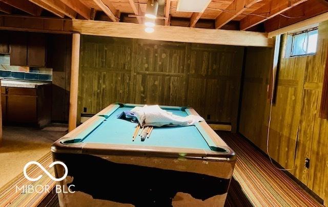 3824 Forest Ridge Dr, Fort Wayne, IN 46804 - playroom featuring billiards table, wooden walls, and dark colored carpet