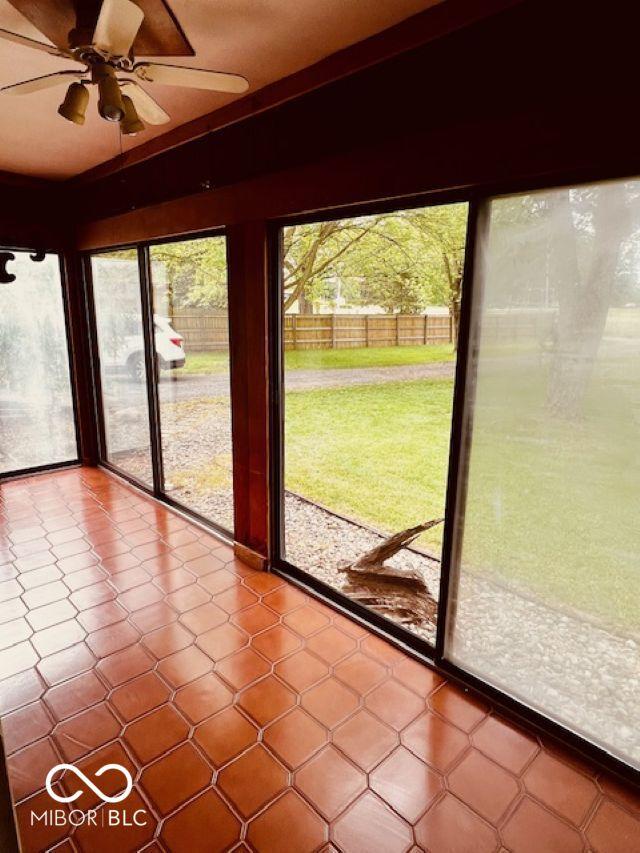 3824 Forest Ridge Dr, Fort Wayne, IN 46804 - unfurnished sunroom with a ceiling fan