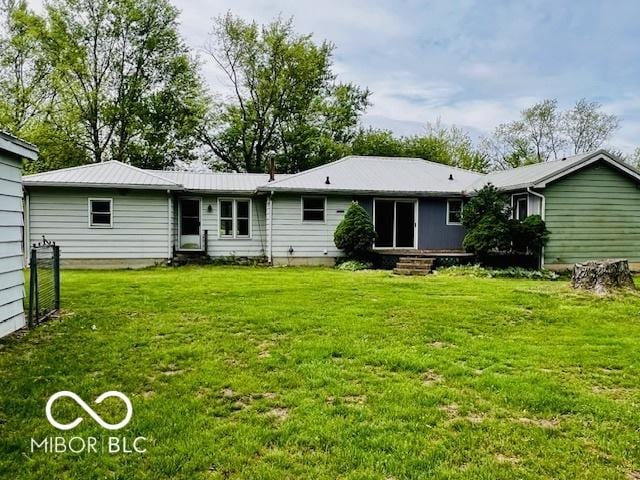 3824 Forest Ridge Dr, Fort Wayne, IN 46804 - back of house with a yard and metal roof