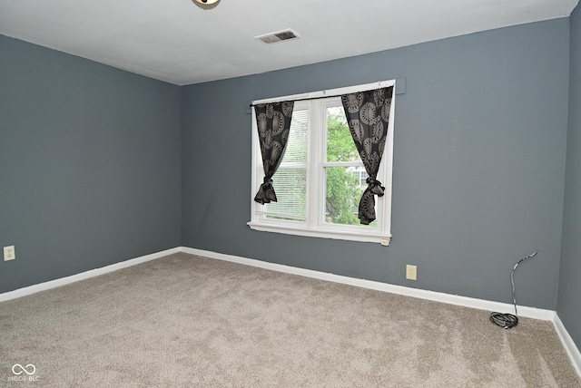 2622 Ethel Ave, Indianapolis, IN 46208 - carpeted spare room featuring baseboards