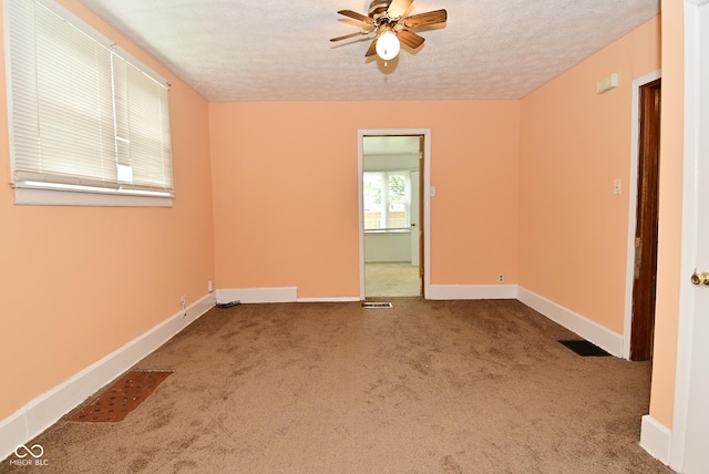 2622 Ethel Ave, Indianapolis, IN 46208 - carpeted spare room featuring a ceiling fan, a textured ceiling, and baseboards