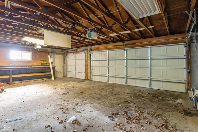 3735 Marrison Pl, Indianapolis, IN 46205 - garage featuring a garage door opener
