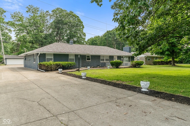 3735 Marrison Pl, Indianapolis, IN 46205 - single story home with a chimney, a front lawn, and an outbuilding