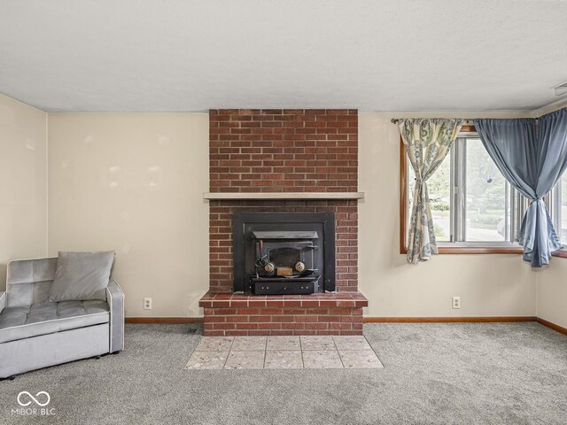 4305 Clinton St, Lawrence, IN 46226 - unfurnished living room featuring carpet floors, baseboards, and a fireplace
