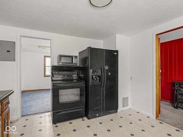 4305 Clinton St, Lawrence, IN 46226 - kitchen featuring black appliances, electric panel, a textured ceiling, baseboards, and light carpet