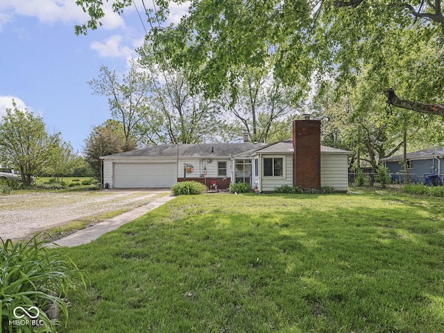 4305 Clinton St, Lawrence, IN 46226 - single story home with driveway, a chimney, and an attached garage