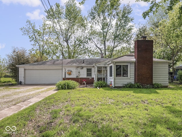 4305 Clinton St, Lawrence, IN 46226 - single story home featuring driveway, a garage, a front lawn, and a chimney