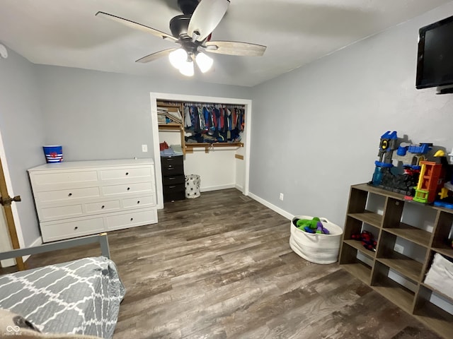 6593 N 800 W, Elwood, IN 46036 - bedroom featuring wood finished floors, ceiling fan, baseboards, and a closet