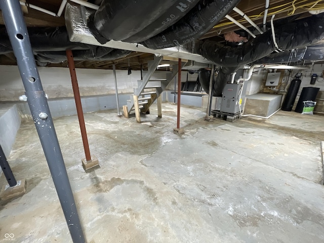 6593 N 800 W, Elwood, IN 46036 - unfinished below grade area featuring stairs and heating unit