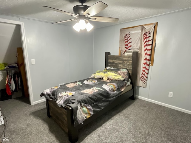 6593 N 800 W, Elwood, IN 46036 - carpeted bedroom with a textured ceiling, ceiling fan, and baseboards