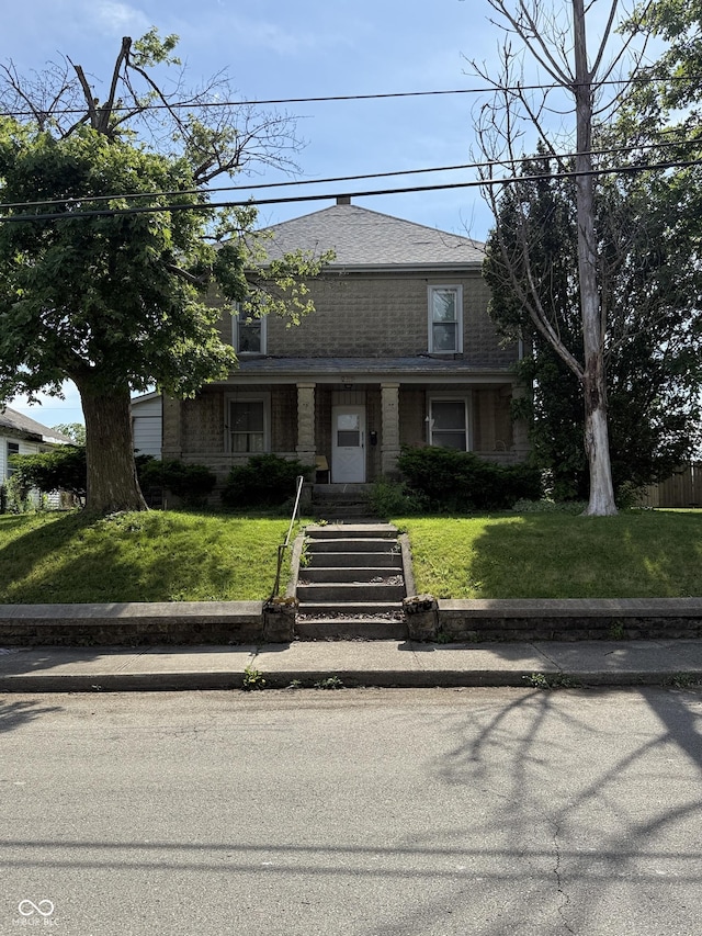 2310 Noble St, Anderson, IN 46016 - view of front of home with a front lawn