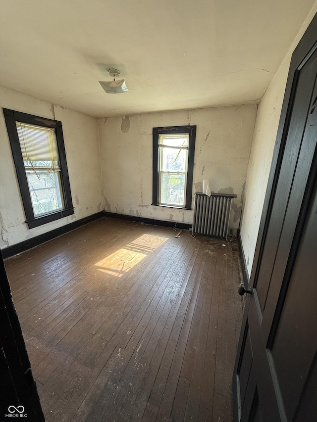 2310 Noble St, Anderson, IN 46016 - empty room featuring dark wood finished floors