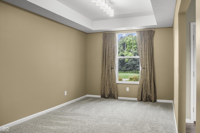9018 E Gayle Dr, Morgantown, IN 46160 - carpeted spare room with a tray ceiling and baseboards