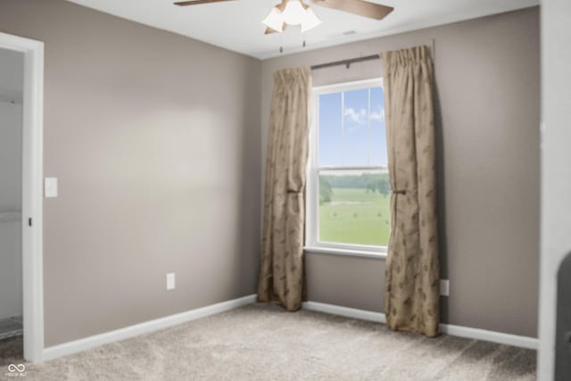 9018 E Gayle Dr, Morgantown, IN 46160 - empty room with a ceiling fan, plenty of natural light, and carpet floors
