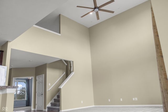 9018 E Gayle Dr, Morgantown, IN 46160 - staircase with a ceiling fan and high vaulted ceiling