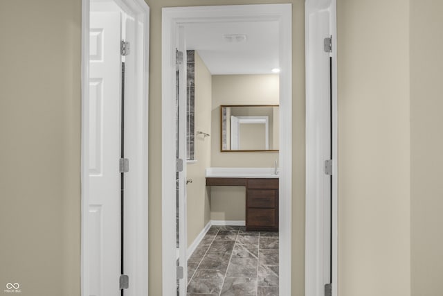 9018 E Gayle Dr, Morgantown, IN 46160 - corridor featuring marble finish floors and baseboards