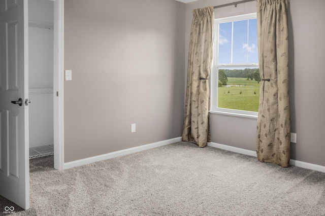 9018 E Gayle Dr, Morgantown, IN 46160 - carpeted empty room with baseboards
