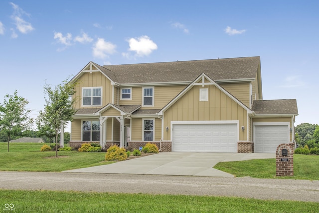 9018 E Gayle Dr, Morgantown, IN 46160 - craftsman house with concrete driveway, brick siding, a front lawn, board and batten siding, and roof with shingles