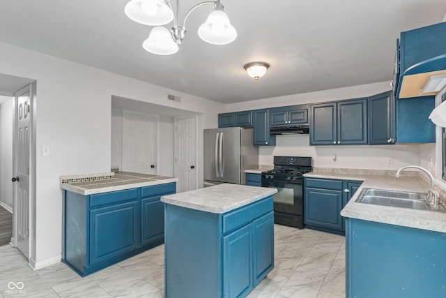 1408 Snead Cir, Avon, IN 46123 - kitchen with black gas range oven, freestanding refrigerator, light marble finish flooring, and under cabinet range hood