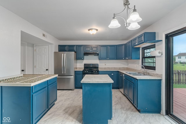 1408 Snead Cir, Avon, IN 46123 - kitchen featuring stainless steel appliances, blue cabinetry, a sink, under cabinet range hood, and a center island