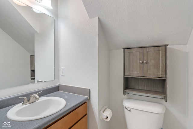 1408 Snead Cir, Avon, IN 46123 - bathroom featuring toilet, vanity, and lofted ceiling
