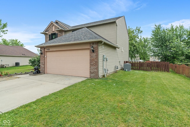 1408 Snead Cir, Avon, IN 46123 - view of home's exterior with a garage, a shingled roof, brick siding, central AC unit, and driveway