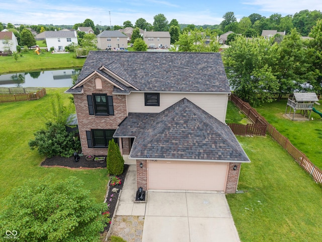 1408 Snead Cir, Avon, IN 46123 - traditional home with brick siding, roof with shingles, a water view, and concrete driveway