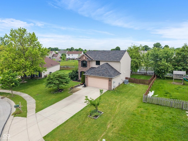 1408 Snead Cir, Avon, IN 46123 - view of front of house with driveway, brick siding, and a garage