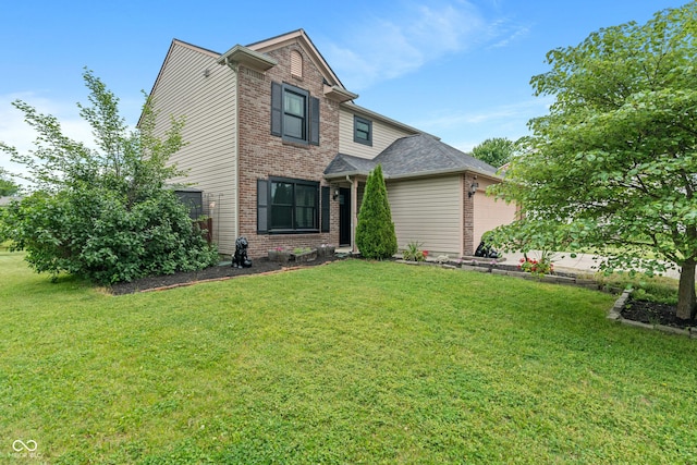 1408 Snead Cir, Avon, IN 46123 - traditional home with brick siding, an attached garage, and a front yard