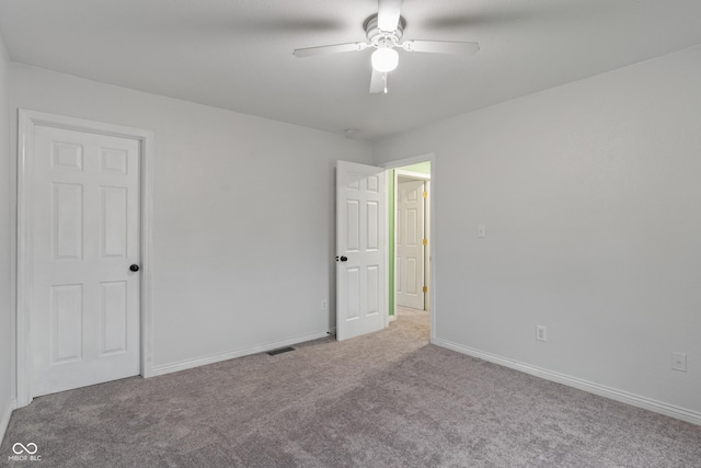 1408 Snead Cir, Avon, IN 46123 - unfurnished bedroom featuring carpet flooring, baseboards, and ceiling fan
