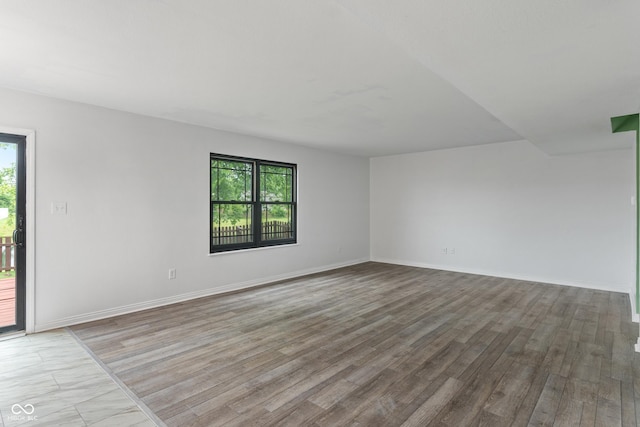 1408 Snead Cir, Avon, IN 46123 - unfurnished room with plenty of natural light, wood finished floors, and baseboards