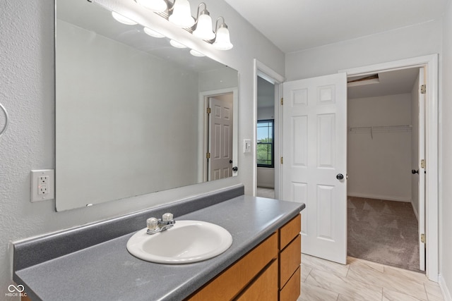 1408 Snead Cir, Avon, IN 46123 - bathroom with vanity and a spacious closet