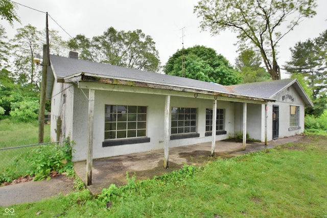 10577 Dalton Rd, Hagerstown, IN 47346 - back of house featuring a patio area and stucco siding