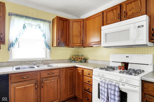 101 Heiny Rd, Indianapolis, IN 46217 - kitchen with white appliances, a sink, light countertops, brown cabinets, and crown molding
