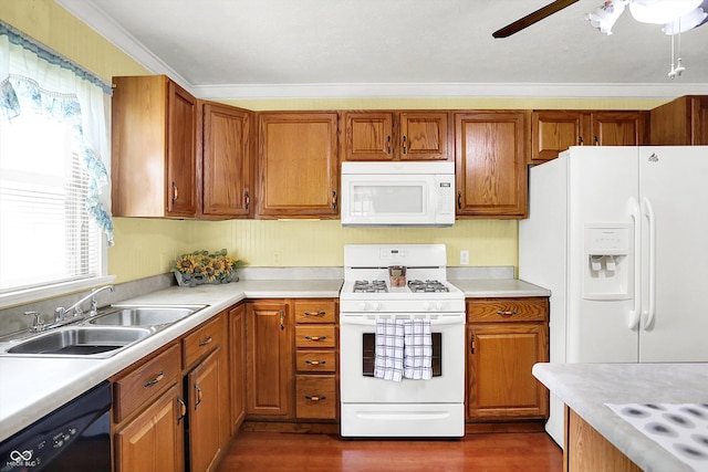 101 Heiny Rd, Indianapolis, IN 46217 - kitchen with white appliances, a sink, light countertops, a ceiling fan, and brown cabinets