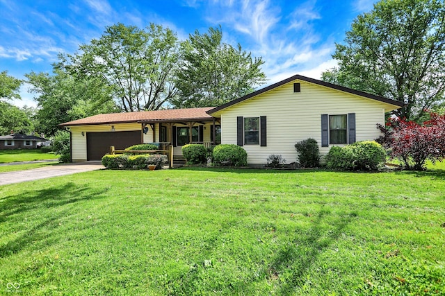 101 Heiny Rd, Indianapolis, IN 46217 - single story home with an attached garage, concrete driveway, a front lawn, and a porch
