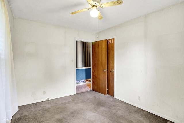 101 Heiny Rd, Indianapolis, IN 46217 - spare room with carpet, a ceiling fan, and baseboards