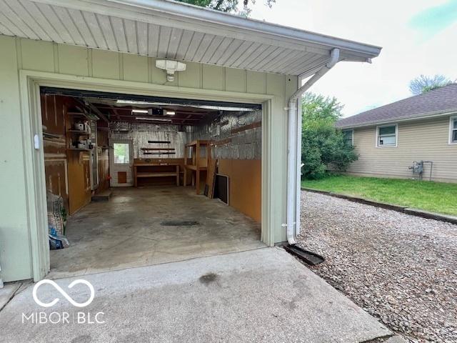 1834 Chandler Ln, Columbus, IN 47203 - garage featuring concrete driveway