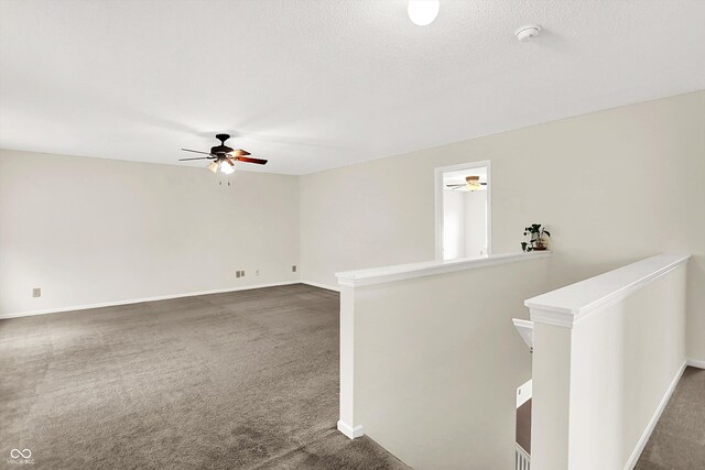 630 Harmony Way, Greenwood, IN 46143 - carpeted spare room with a ceiling fan, baseboards, and a smoke detector
