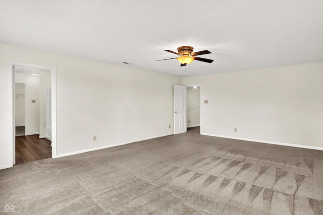 630 Harmony Way, Greenwood, IN 46143 - spare room featuring carpet, ceiling fan, and baseboards