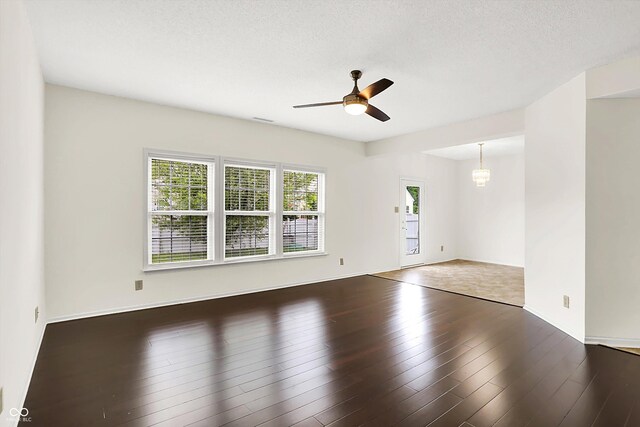 630 Harmony Way, Greenwood, IN 46143 - unfurnished room featuring a ceiling fan, wood finished floors, and baseboards