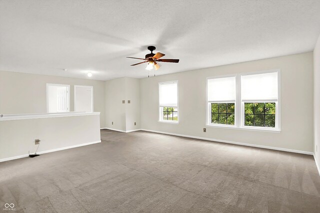 630 Harmony Way, Greenwood, IN 46143 - unfurnished room with a ceiling fan, carpet floors, and baseboards