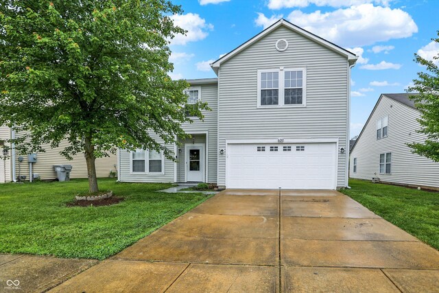 630 Harmony Way, Greenwood, IN 46143 - traditional home featuring an attached garage, a front lawn, and driveway