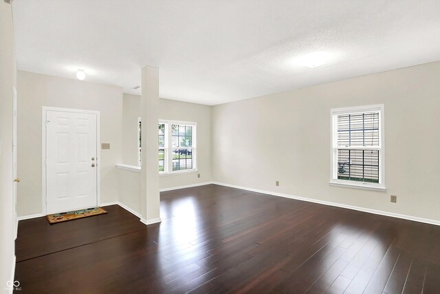 630 Harmony Way, Greenwood, IN 46143 - foyer featuring dark wood-style floors and baseboards