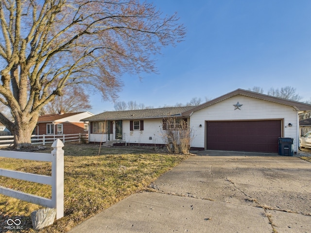 619 Belzer Dr, Anderson, IN 46011 - ranch-style house featuring driveway and an attached garage
