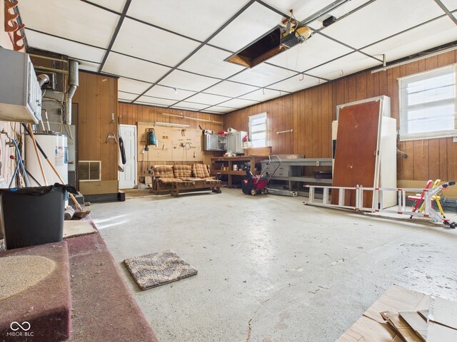 619 Belzer Dr, Anderson, IN 46011 - garage featuring wooden walls
