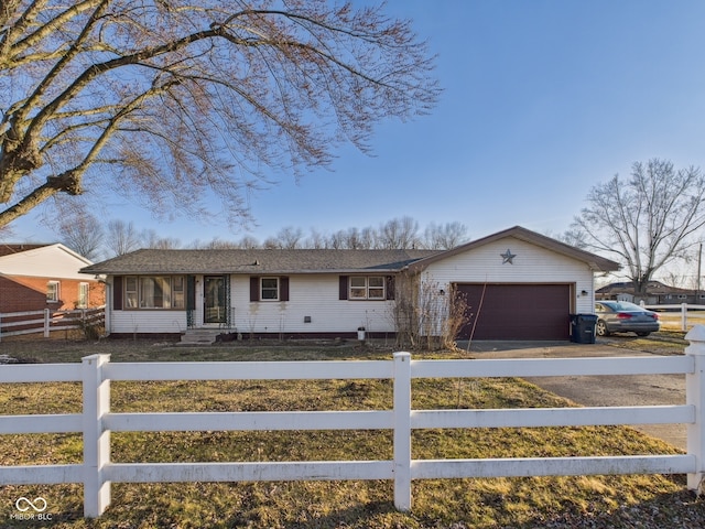 619 Belzer Dr, Anderson, IN 46011 - single story home featuring a garage, a fenced front yard, driveway, and entry steps